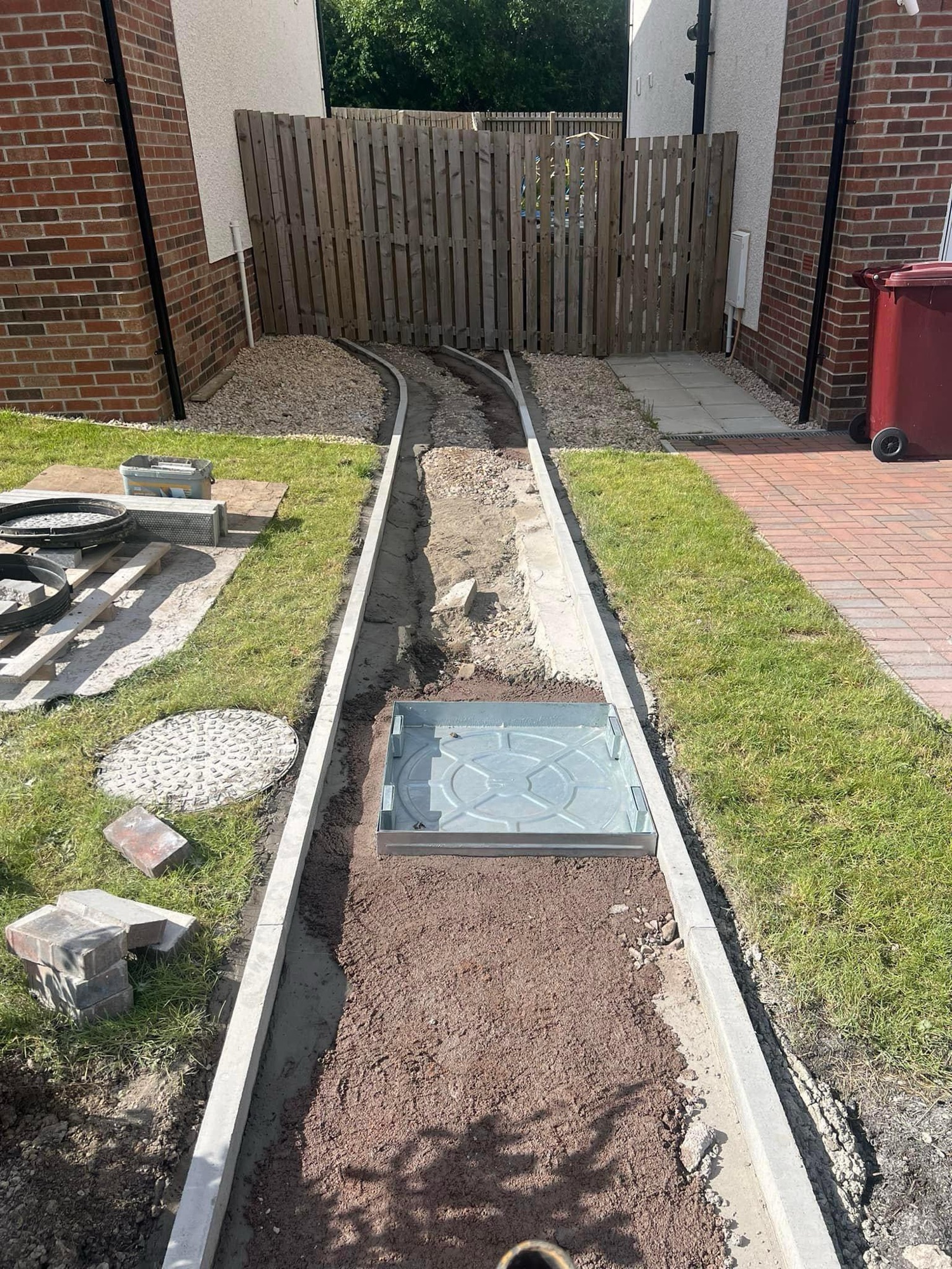 Just to clarify the driveway extension is one side, the pathway the ...